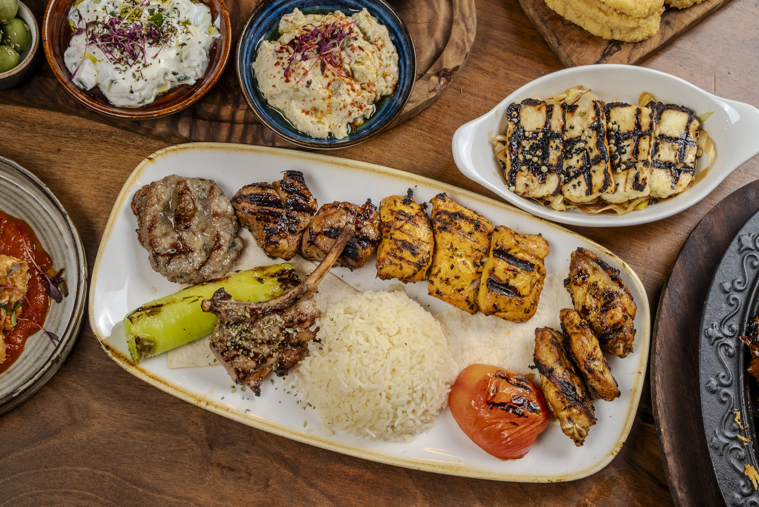 A plate of Turkish specials in Camden, showing traditional Turkish dishes London diners love, served as halal Turkish food at our Turkish grill restaurant.