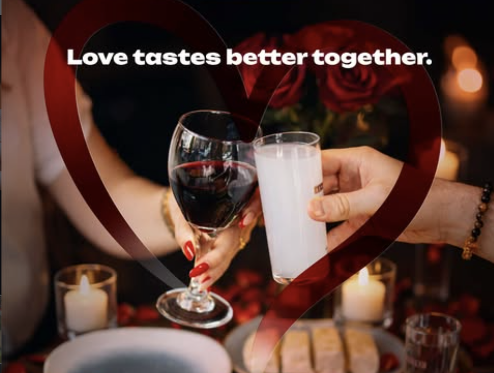 Couple enjoying a romantic dinner at Laz, a warm and welcoming Camden Turkish restaurant serving halal food and signature dishes.